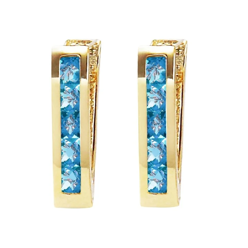 1.2 Carat 14K Solid Gold Oval Huggie Earrings Blue Topaz