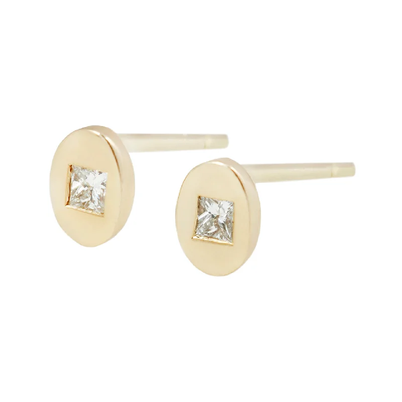 Oval studs with white diamonds