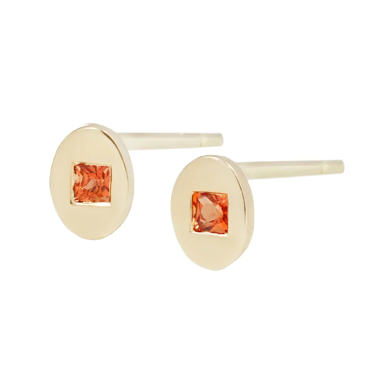 Oval studs with orange sapphire